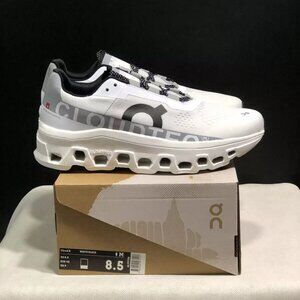 On Running White and Black Sneakers